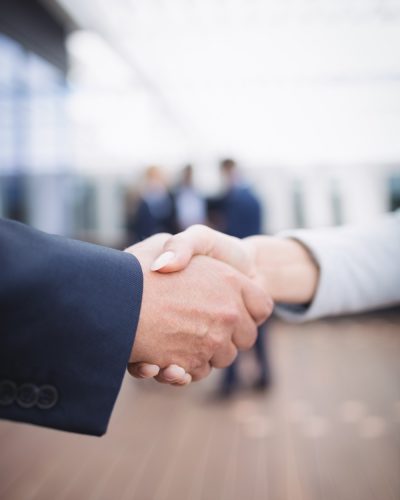 businesspeople-shaking-hands (1)